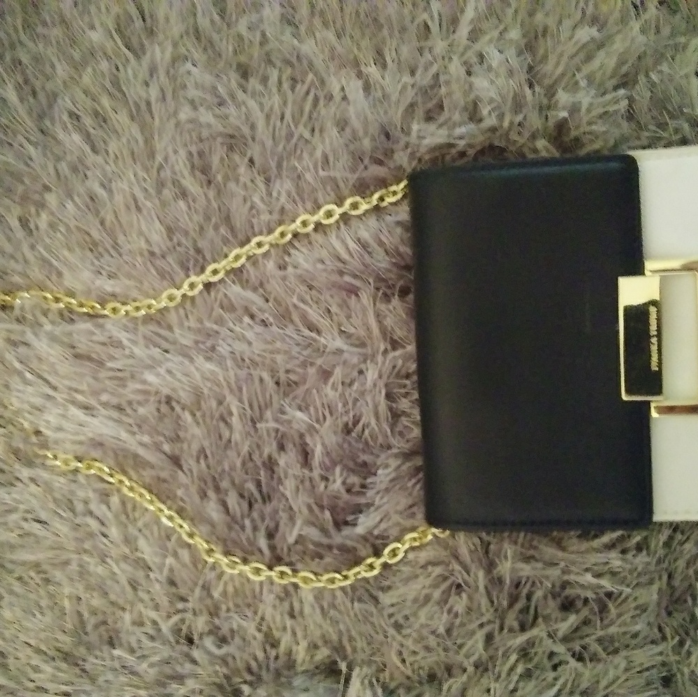 Ivanka Trump clutch with shoulder strap